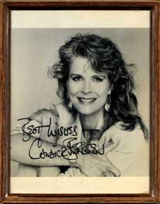 Item #05-2324 Autographed black and white publicity photograph of Sprint spokeswoman Candice...