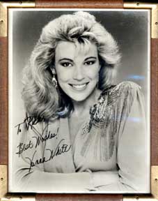 Item #05-2336 Autographed black and white publicity photograph of "Wheel of Fortune" mistress...