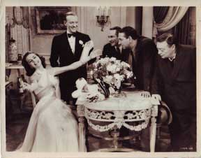 Item #08-0033 Fred Astaire, Cyd Charisse, Peter Lorre. and Janis Page in Silk Stockings (1957)....