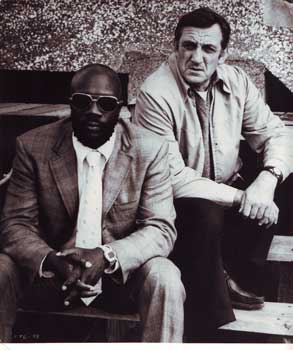 Item #08-0036 Publicity still of Issac Hayes and Lino Ventura in Tough Guys (1974). Columbia...