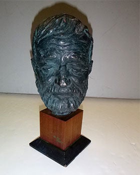 Item #13-1068 Plaster bust of Ernest Hemingway in bronze patina. Thomas Holland.