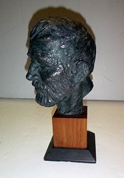 Plaster bust of Ernest Hemingway in bronze patina.