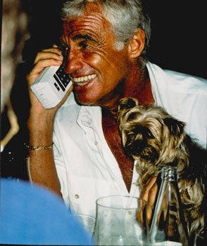 Item #16-4790 Original large format close-up color photograph of Jean Paul Belmondo with his dog...