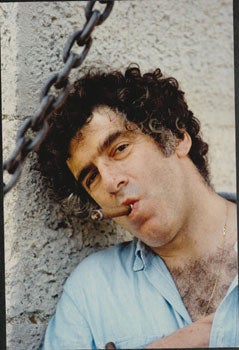 Item #16-4954 Original large format close-up color photograph of Elliot Gould smoking a cigar at...