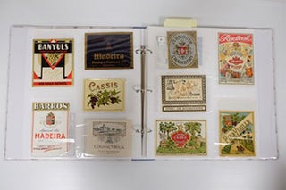Item #16-5261 A Collection of 380 mint fortified drink labels in a large format 3 hole binder....