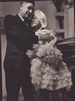 Item #16-5575 Original photograph of Downey Harvey of the Bohemian Club in drag hugging a...