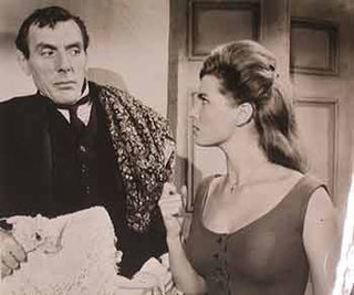 Item #17-1322 Eric Sykes and Scilla Gabel in “Village of Daughters”, 1962....