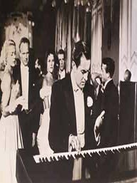 Item #17-1431 Kim Novak and Tyron Power in “The Eddy Duchin Story”, 1956. Columbia Pictures