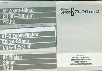 Item #19-5909 Nikon Camera manuals for the AF Zoom-Nikkor 24-85mm f/3.5-4.5, AF Zoom-Nikkor ED 80-200mm f/2.8D, AF Nikkor 28mm f/2.8, Nikon Series E 70-210mm f/4. Nikon Corporation, Tokyo.