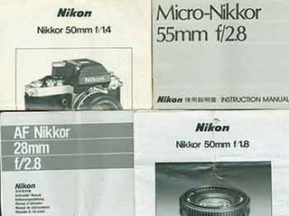 Item #19-5970 Nikon Camera manuals for the AF Nikkor 28mm f/2.8, the Nikkor 50mm f/1.8, the...
