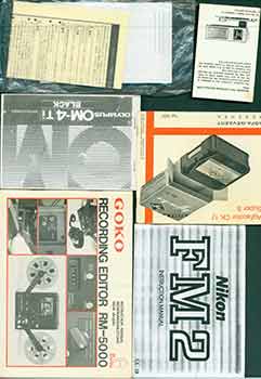 Item #19-6127 Nikon FM-2 Instruction manual, Goko RM-5000 manual, Olympus OM-4 manual, and...