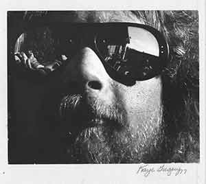 Item #19-7963 Snapshot of man in reflective glasses. Gregory Kaye, photog