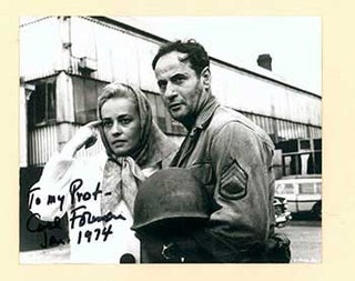 Item #51-3212 Jeanne Moreau and Eli Wallach in "The Victors." Original photograph signed by the...