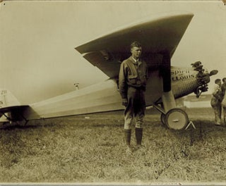 Item #51-3528 Original photograph of Charles Lindbergh next to the Spirit of St. Louis. Signed....
