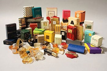Item #51-4989 A collection of miniature perfume bottles with perfume and boxes from Nina Ricci, Chanel, Guerlain, Carolina Herrera et al. Nina Ricci, Chanel, Guerlain, Carolina Herrera.