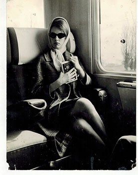 Item #51-5328 Photograph of Anna Karina in a train compartment. Jean-Pierre Laubscher