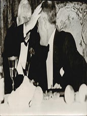 Item #51-6614 Vice-President John Nance Garner taps President Franklin Delano Roosevelt on his...