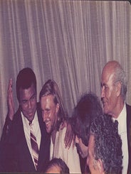 Item #51-7442 Photograph of Muhammad Ali with his arm around Bj&ouml;rn Borg at the Victoria Club,...