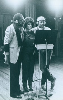 Item #63-0247 Photograph of Sylvester in Recording Studio with backing vocalists. Saul Zaentz...