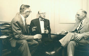 Item #63-2674 Photographic print of three men [including Arthur Meier Schlesinger Sr.?] seated. 20th Century American Photographer.
