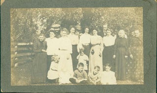 Item #63-2748 Black and White Photograph of a family, fourteen adults standing, five children...