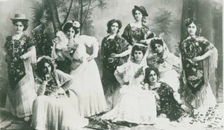Item #63-2759 Black and white photograph of nine ladies dressed up in traditional costume. 20th...
