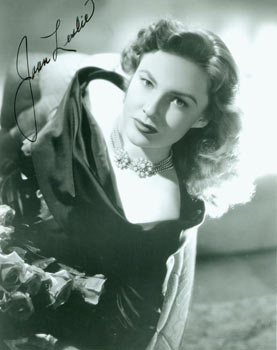 Item #63-3689 Autographed Black and White Photograph of American Actress Joan Leslie. Mid 20th...