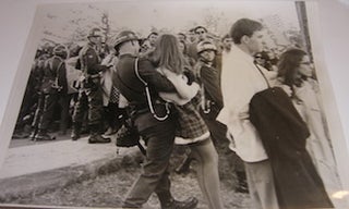 Item #63-9025 B&W Photograph of National Guard soldier groping a young woman at a Vietnam War...