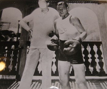 Item #63-9543 Publicity Still of Rudolph Valentino, boxing. Rudolph Valentino.