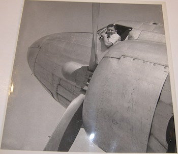 Lisa Robineau & Wesley Adams - Photo of a Pilot Looking out from the Cockpit of an Airplane, with the Names Lisa Robineau & Wesley Adams Stamped on Verso