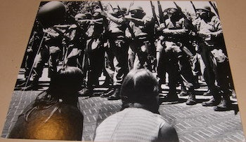 [20th Century American Photographer] - Soldiers with Rifles Wearing Gas Masks. (at Anti-Vietnam War Rally?)