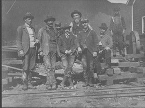 Item #65-0324 Photo of men and boys building a railroad. Anonymous