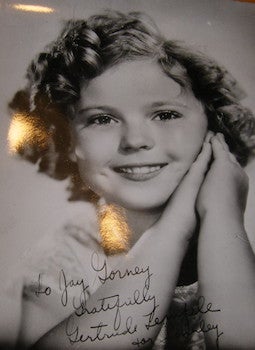 Item #68-1678 Shirley Temple, signed on behalf of Temple. Modern Screen Photographer.
