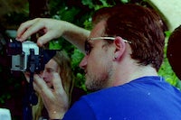 Item #68-2284 Bono & others. Strip of Five Color Negatives. [Cannes Film Festival] 1998. Alain...