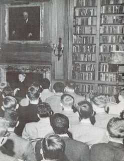 Item #69-8422 [Young men in a library]. Mid 20th century photographer.