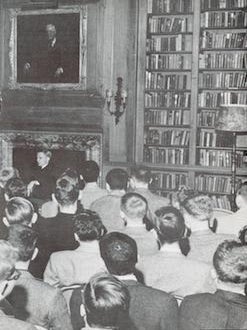 Item #69-8422 [Young men in a library]. Mid 20th century photographer