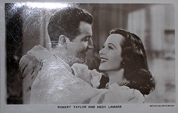 Item #70-0025 Robert Taylor and Hedy Lamarr. (Scene from Lady of the Tropics). 20th Century Photographer.