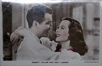 Item #70-0158 Robert Taylor and Hedy Lamarr. (Scene from Lady of the Tropics). 20th Century Photographer.