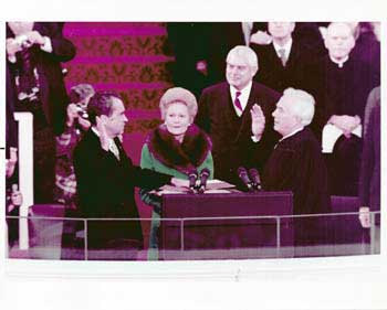 Item #70-0591 Original official White House color photograph of President Richard Nixon's swearing-in ceremony. Also present, First Lady Pat Nixon. Official White House Photographer.