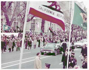 Item #70-0600 Original official White House color photograph of President Richard Nixon and First Lady Pat Nixon waving from an open-top automobile during inauguration parade. Official White House Photographer.