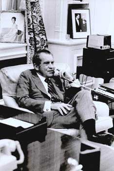 Item #70-0657 Original official White House photograph of President Richard Nixon talking on...