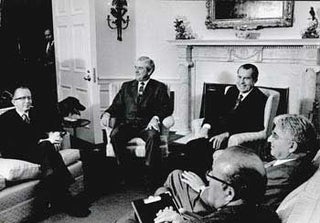 Item #70-0714 Original official White House photograph of President Richard Nixon with Economic...